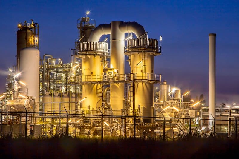 Industrial plant at night, the kind of site that needs fire and emergency teams